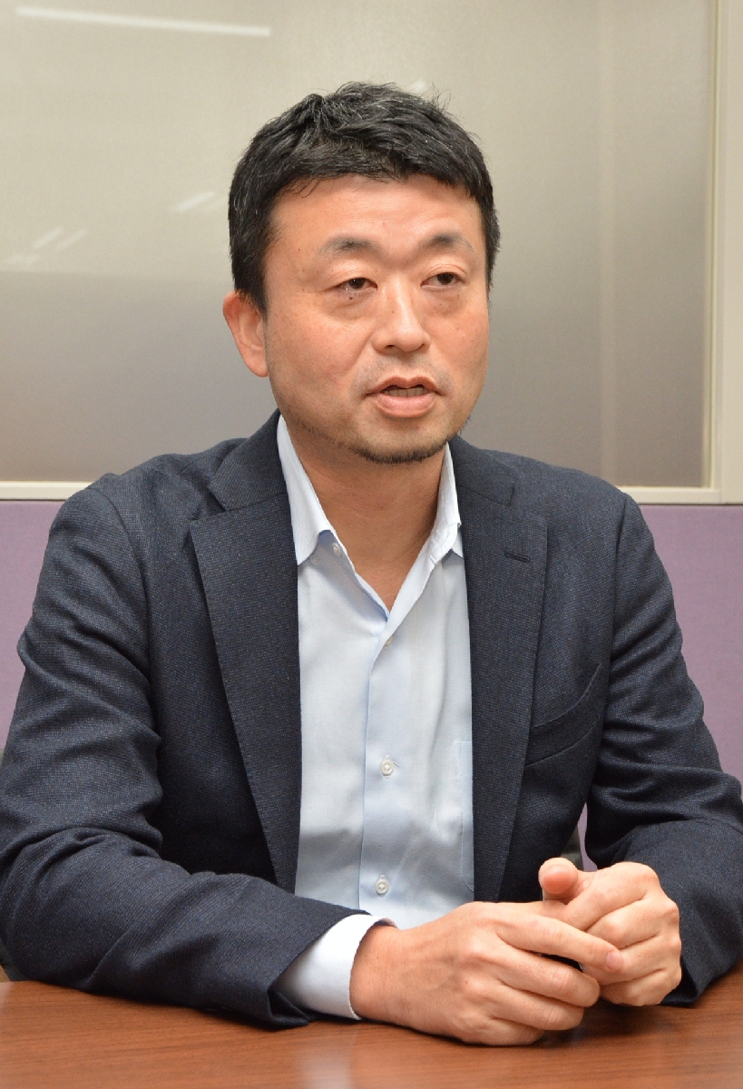 外国人材受け入れが産業発展の鍵になると主張する是川夕氏=2025年12月下旬、八戸市