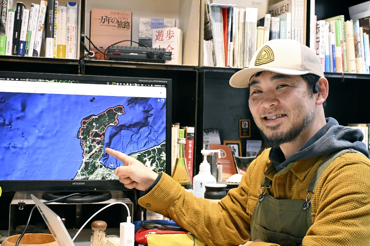 能登半島のロングトレイル構想を説明する長谷川普さん=東京都港区