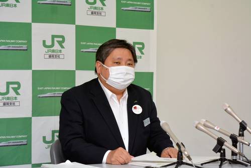 職域接種の見通しを説明する石田亨支社長=9日、青森市